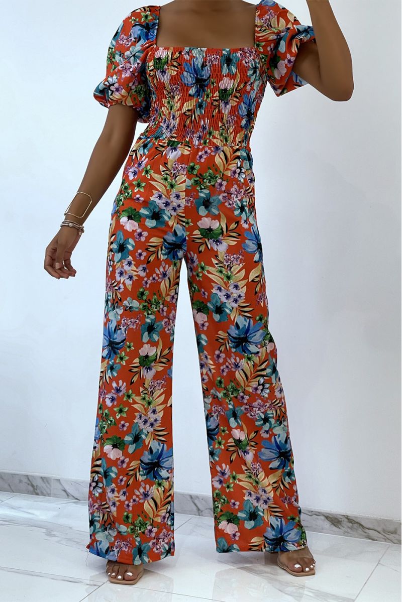 Gebloemde oranje jumpsuit met bell bottoms en strapless top met elastische borst, essentieel voor de zomer - 2