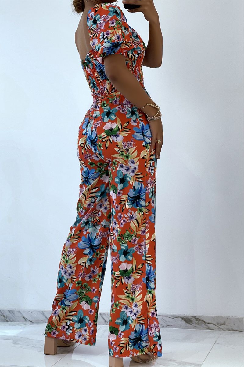 Gebloemde oranje jumpsuit met bell bottoms en strapless top met elastische borst, essentieel voor de zomer - 4