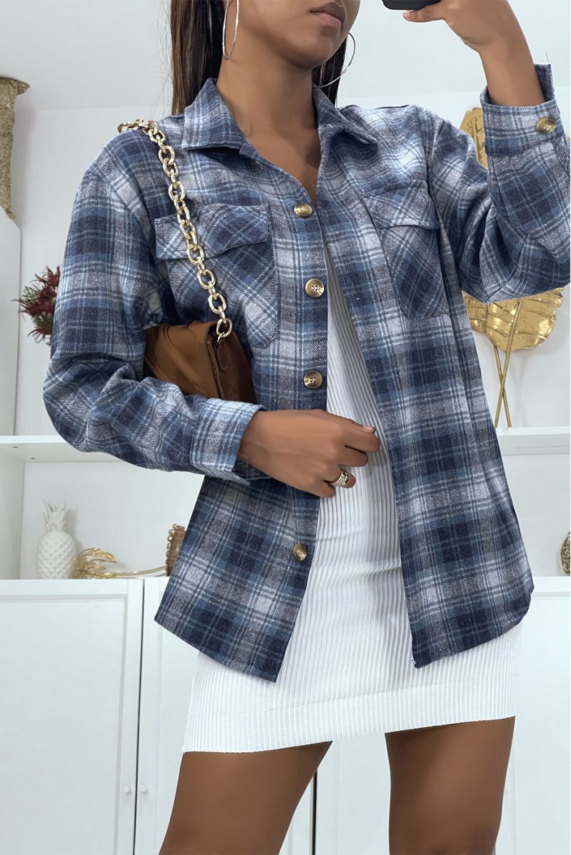 On a lumberjack-style blue checkered shirt with a lapel collar and buttons, ideal for an autumn evening - 2