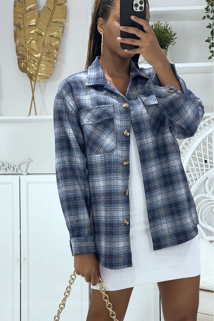 On a lumberjack-style blue checkered shirt with a lapel collar and buttons, ideal for an autumn evening - 3