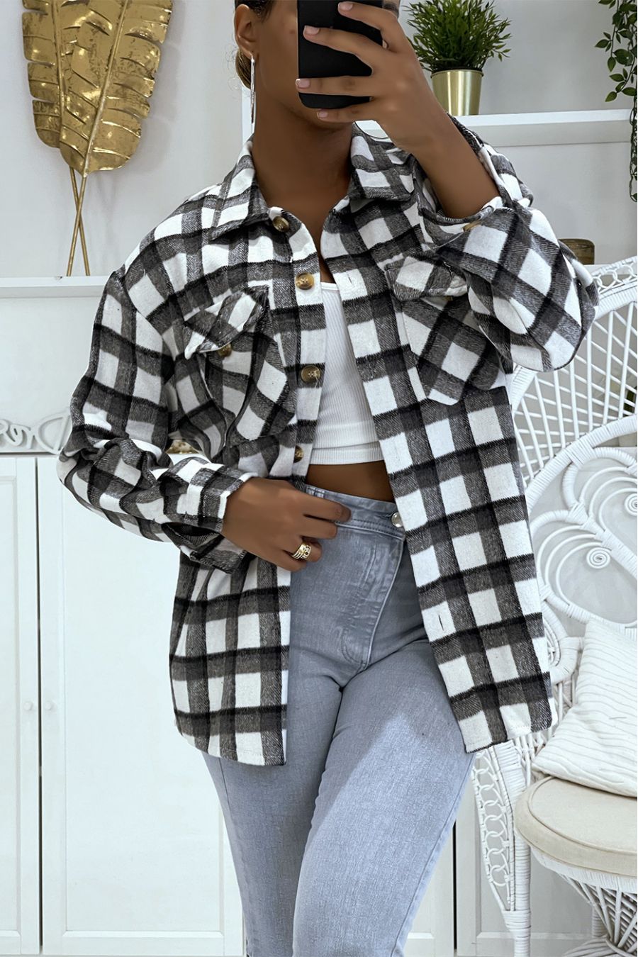 On a warm and soft black checked shirt - 1