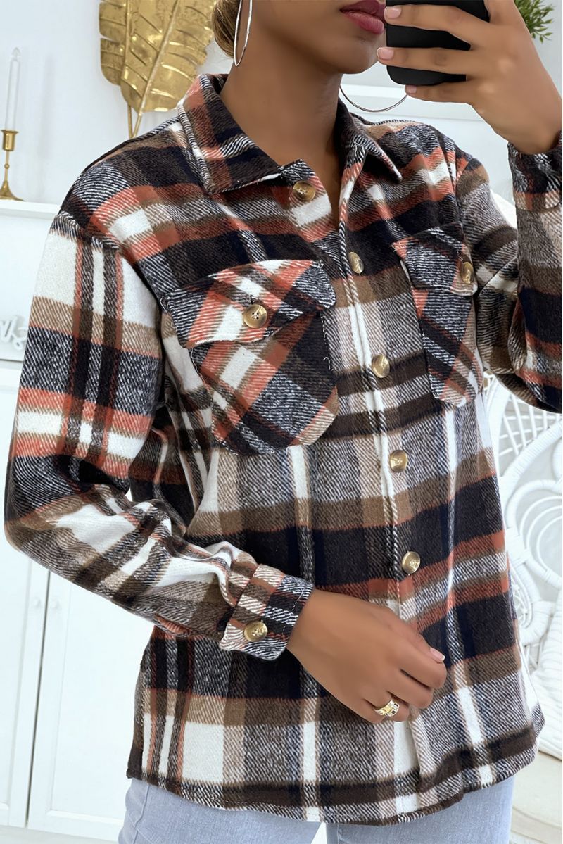 On a warm and soft brown checked shirt - 3