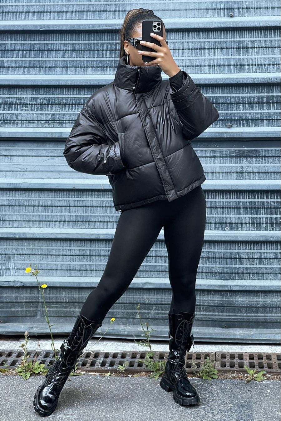 Black adjustable waist down jacket with pockets and bag