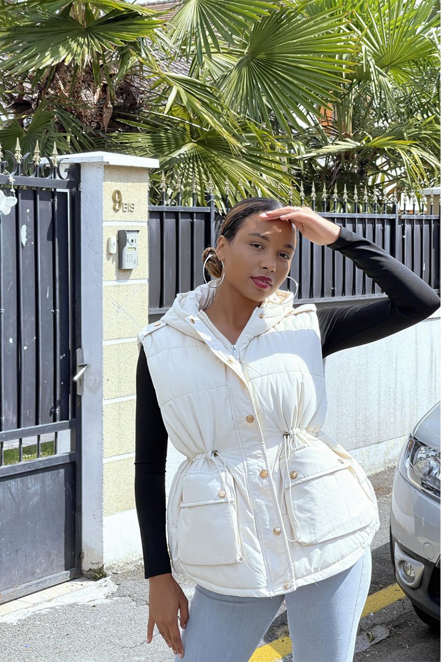 Beige sleeveless down jacket with hood and adjustable waist - 2