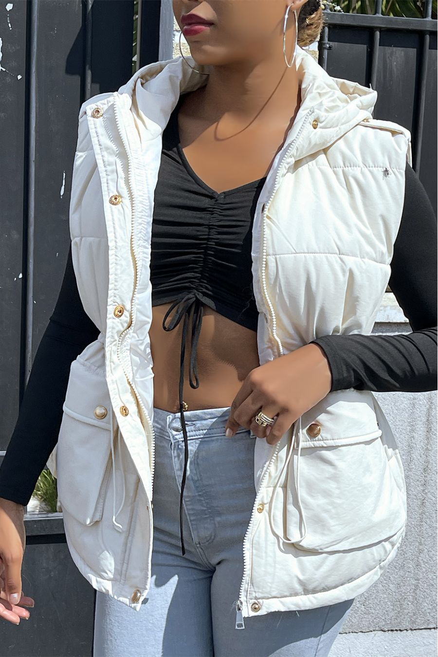 Beige sleeveless down jacket with hood and adjustable waist - 1