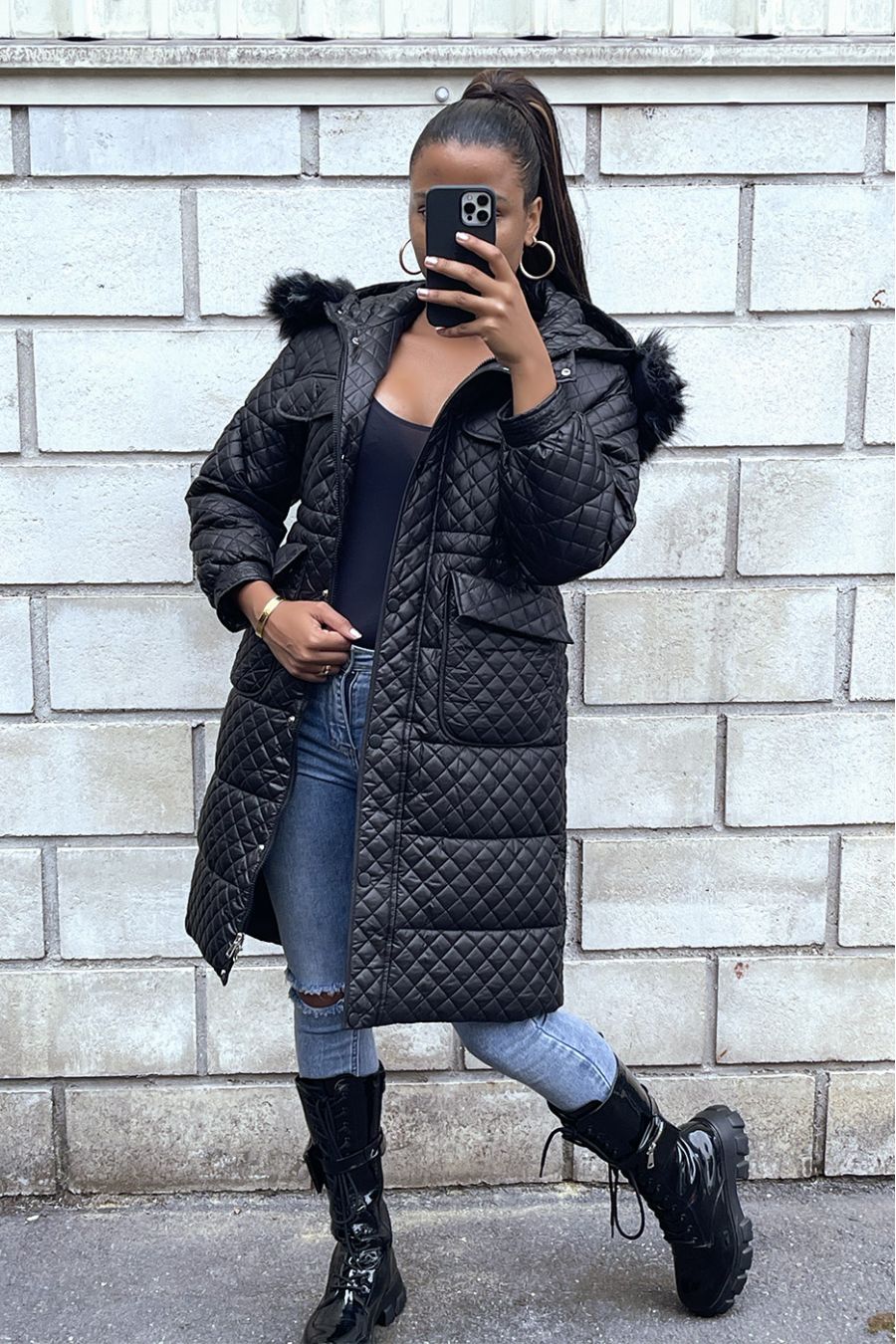 Long black quilted down jacket with hood and pockets - 1