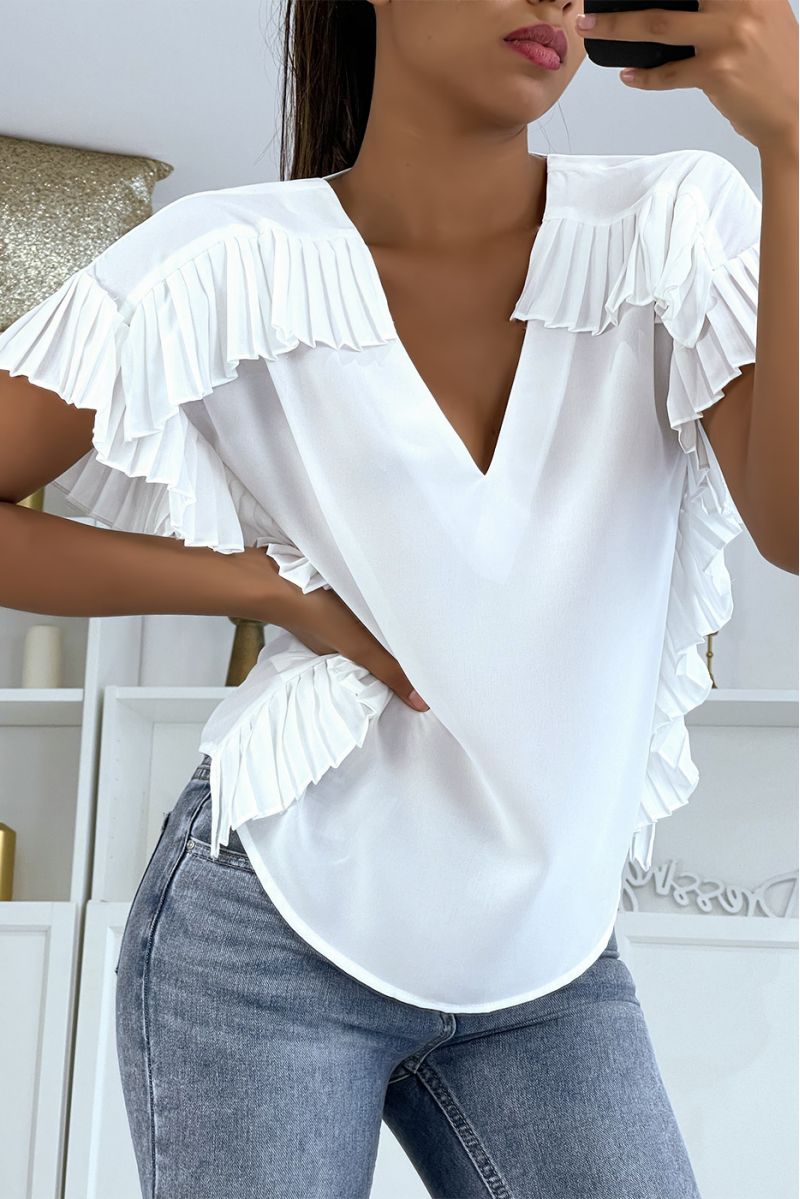 White crepe blouse with pleats on the edges