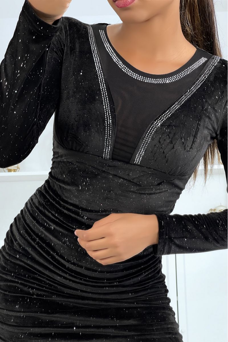 Black velvet dress with lace, rhinestones and long sleeves.