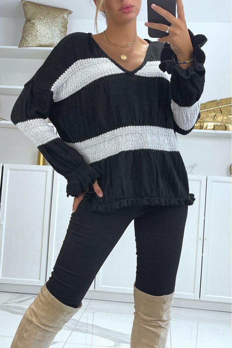 Fluffy black sweater with shiny yarn and ruffle