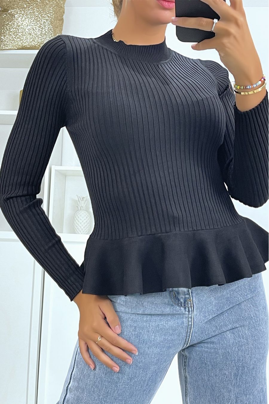 Black ribbed peplum cut sweater with high collar