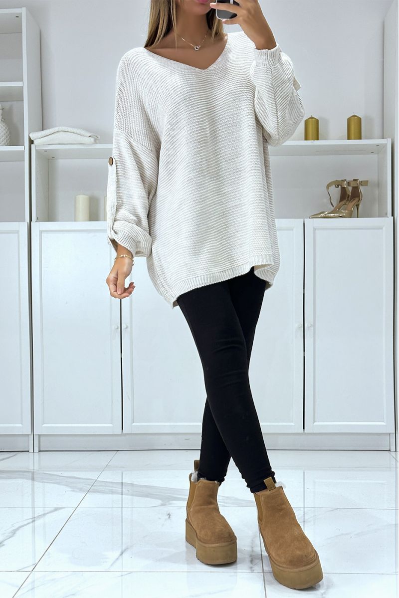 Oversized beige sweater with puff sleeves and V-neck - 1