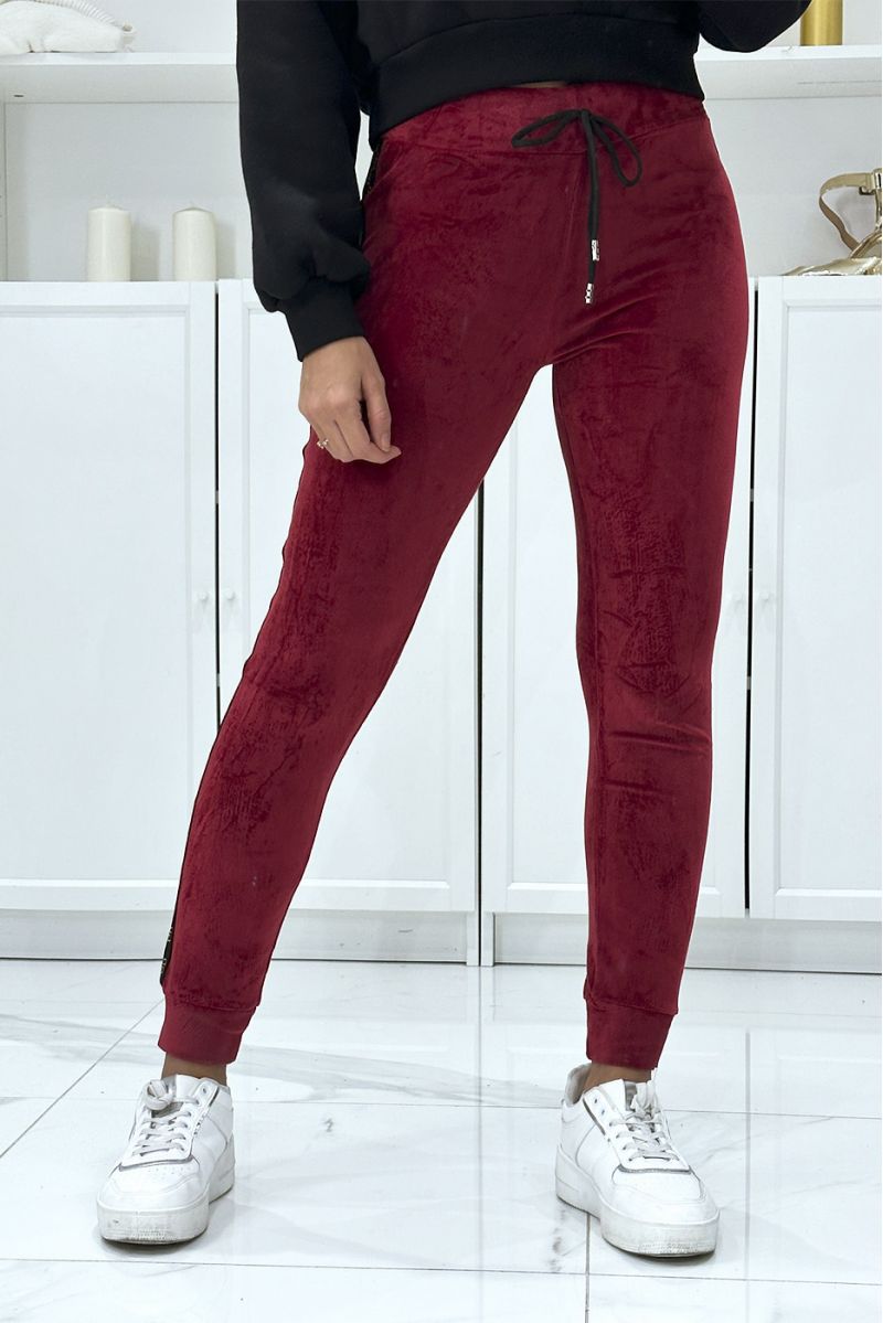 Burgundy joggers in peach skin with inpi bands on the sides - 1