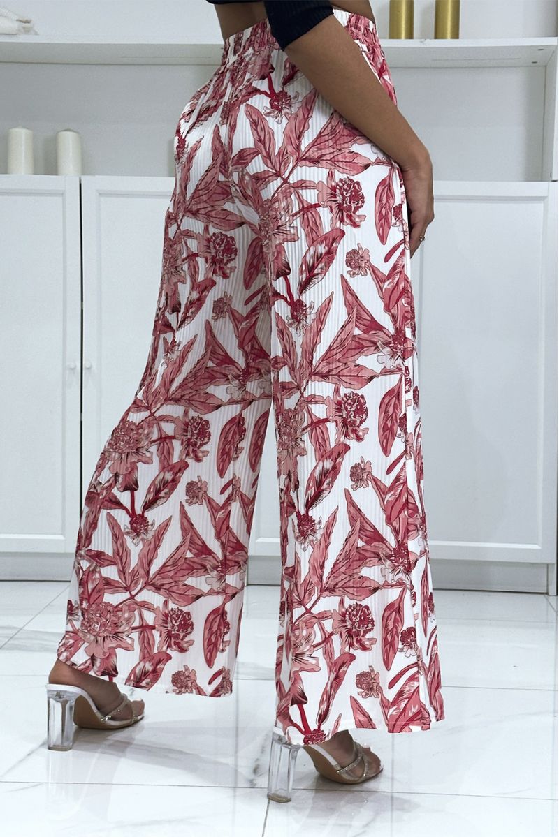 Pink pleated palazzo pants with floral pattern - 1