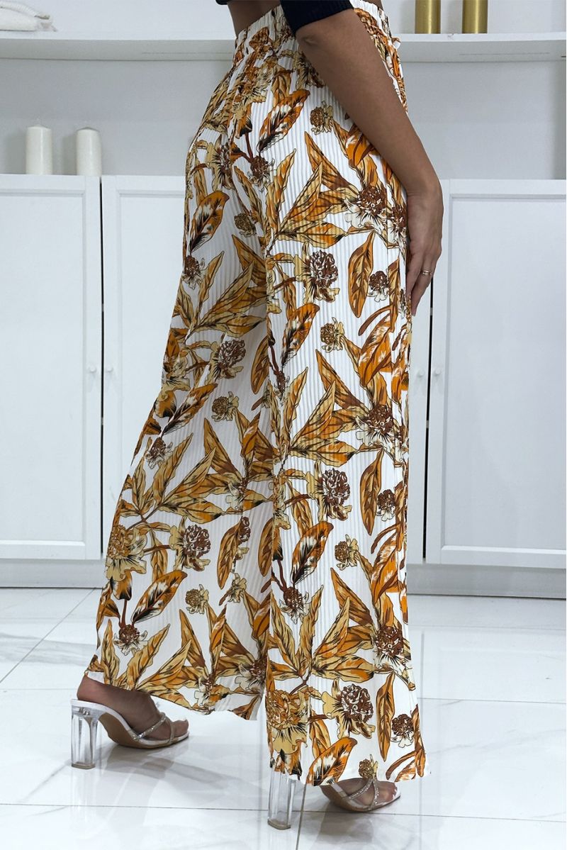 Orange pleated palazzo pants with floral pattern - 1