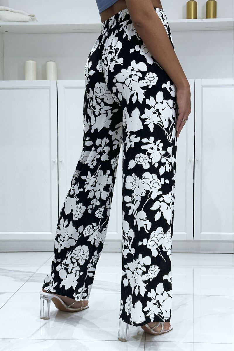 Pantalon palazzo noir et blanc en coton motif fleuris - 1