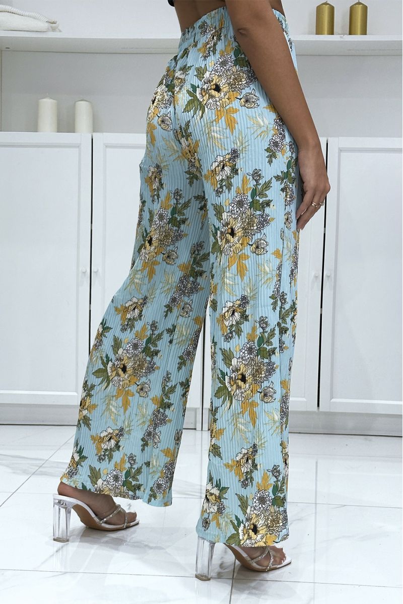 Turquoise pleated palazzo pants with floral pattern - 1