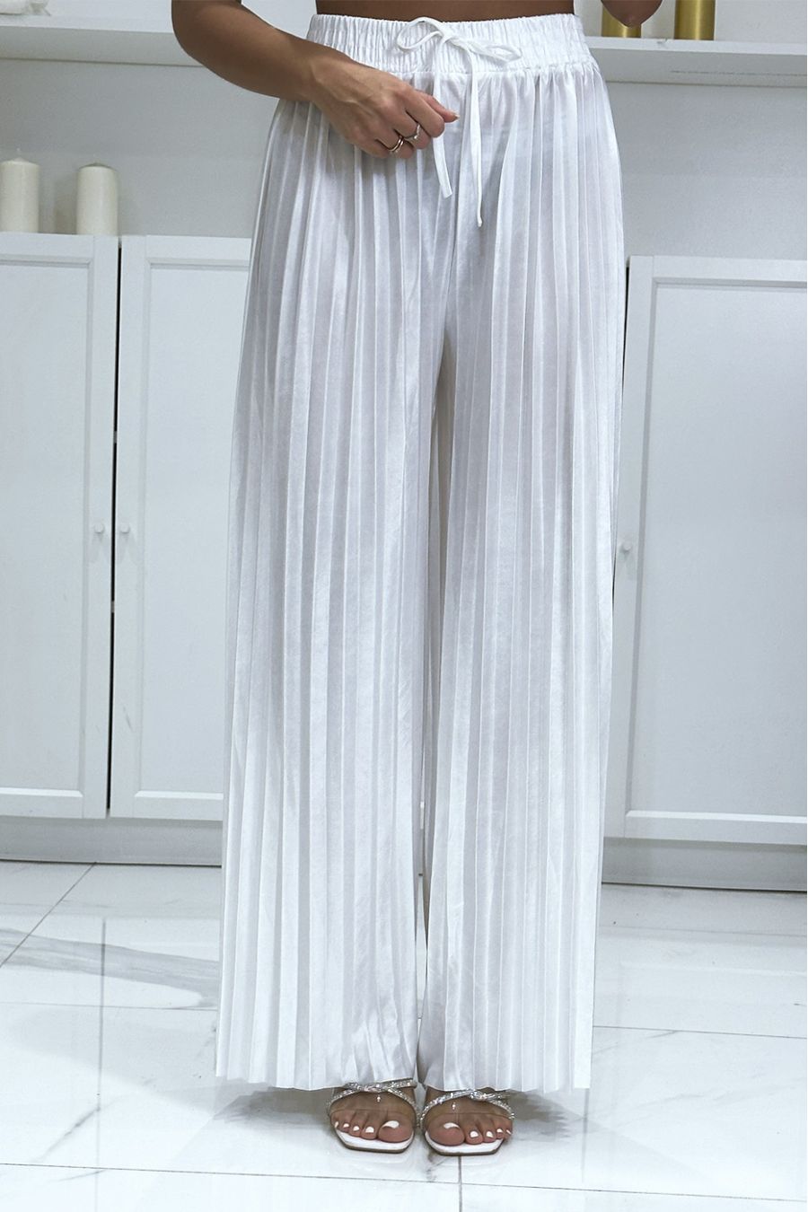 White satin pleated palazzo pants