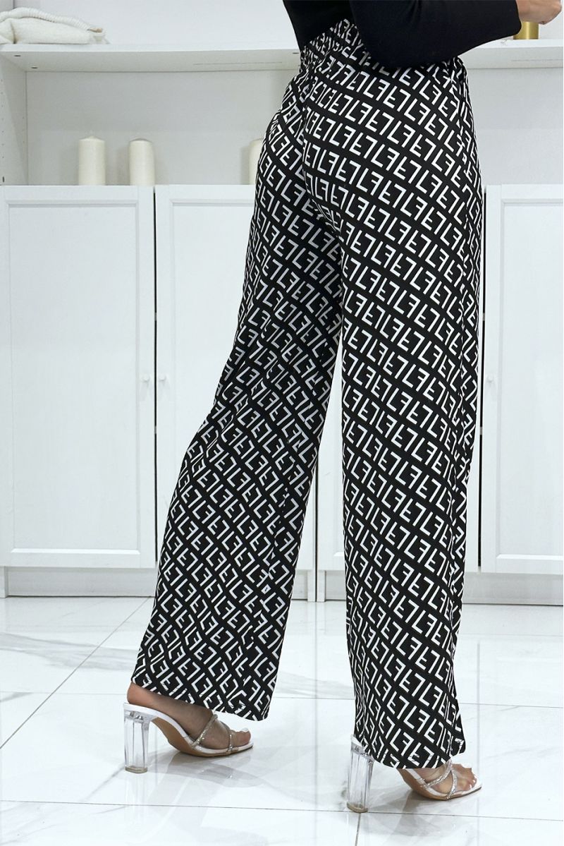 Brand inspired black and white F motif palazzo trousers - 1