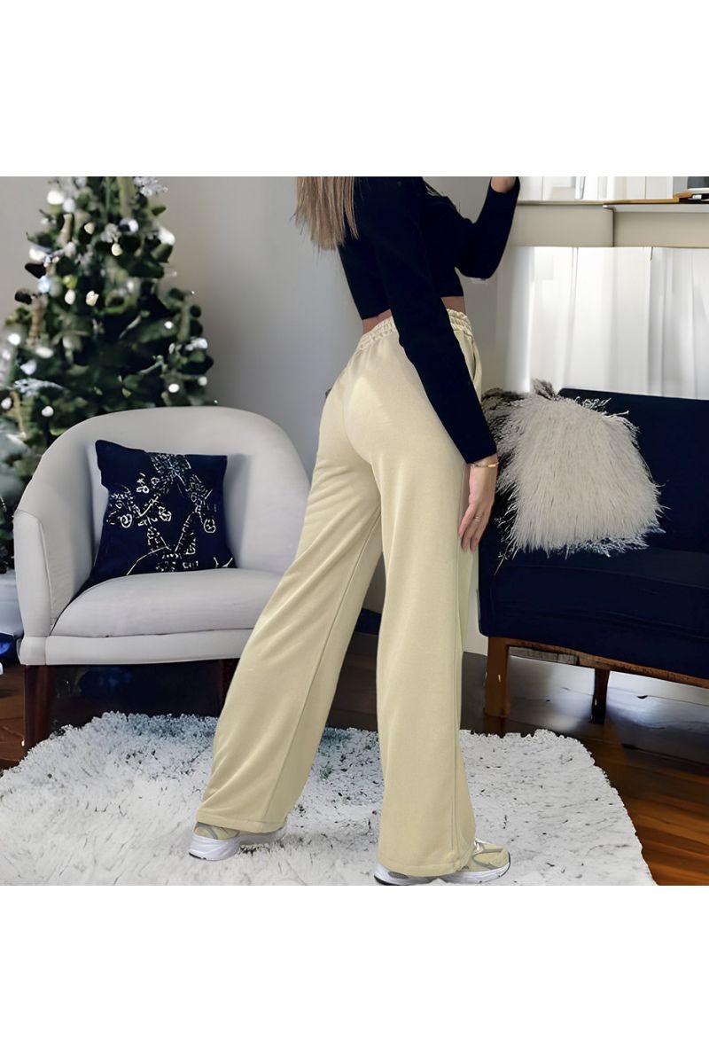 Pantalon palazzo beige avec poches et ceinture  - 3