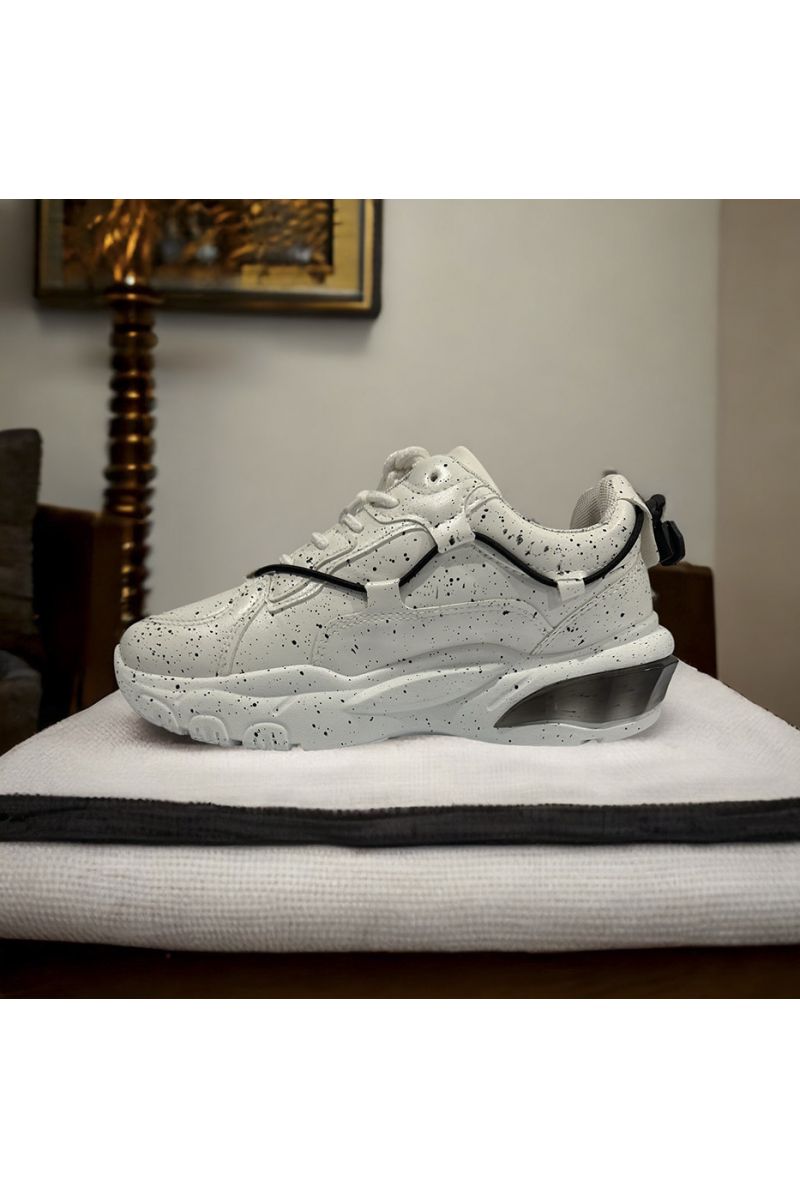White sneaker with lace and paint stain - 1