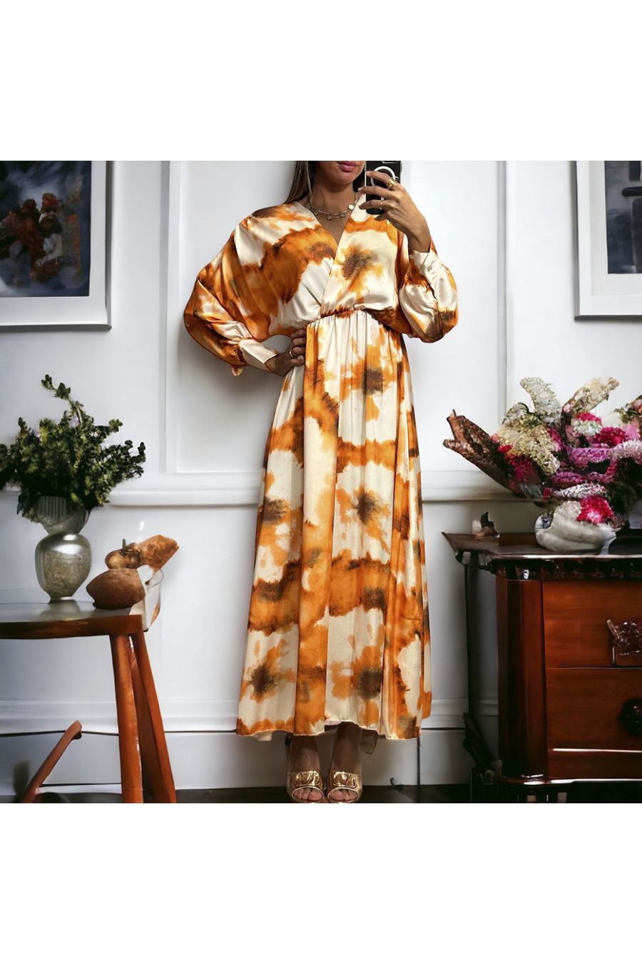 Long orange satin dress with pretty pastel pattern