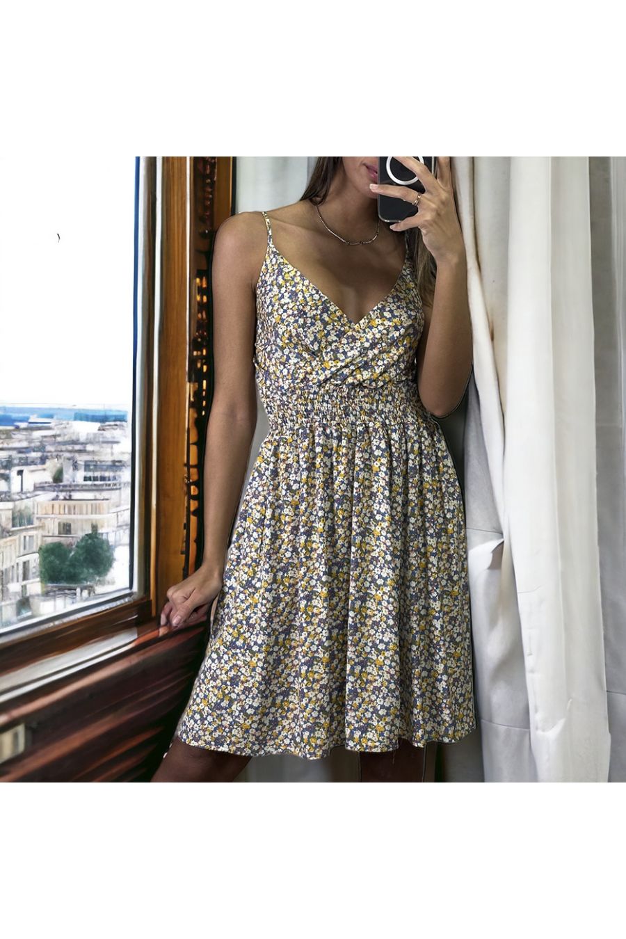 Blue liberty pattern dress with straps gathered at the waist