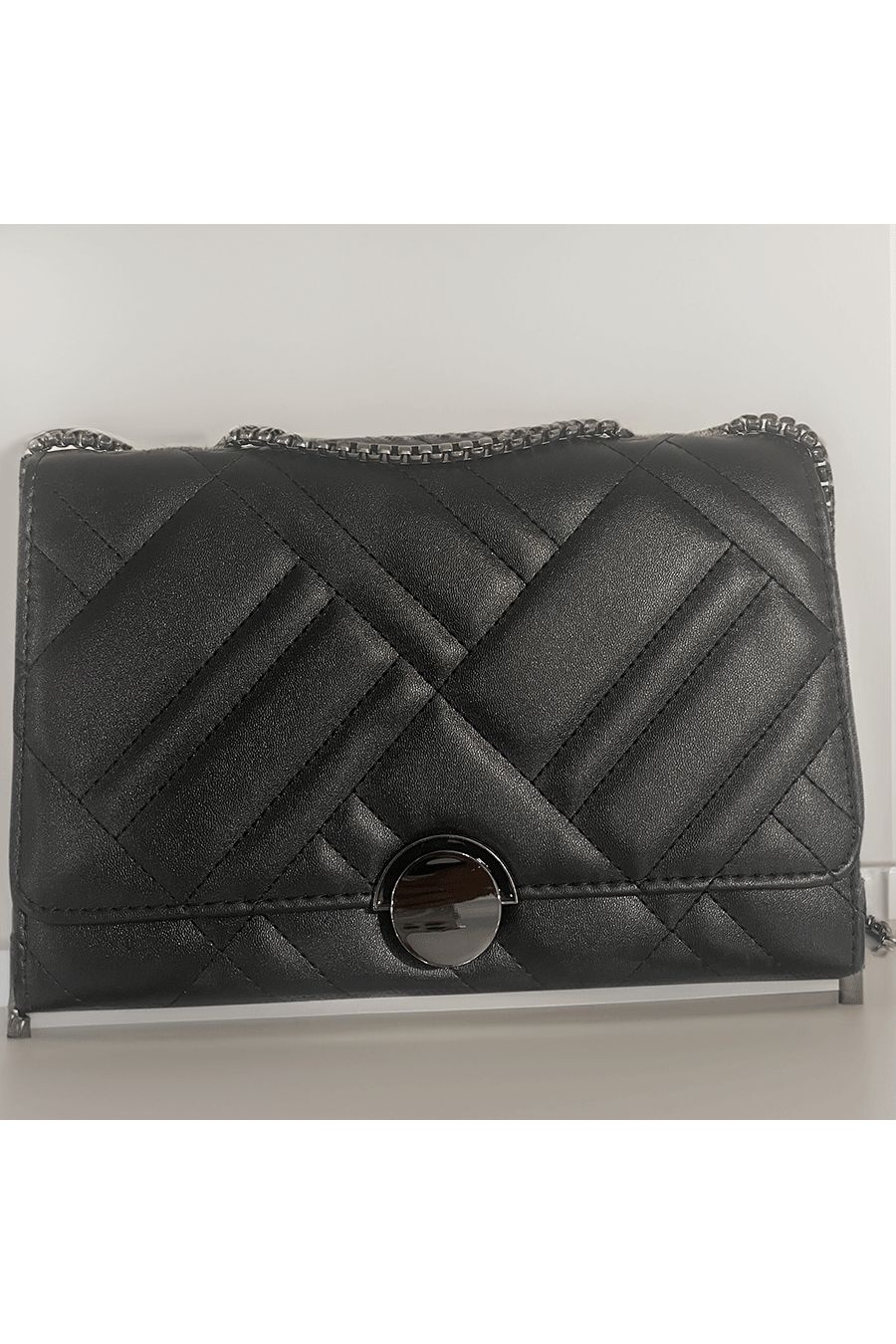 Black quilted handbag - 1