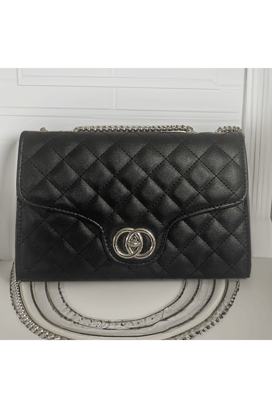 Black quilted handbag - 1