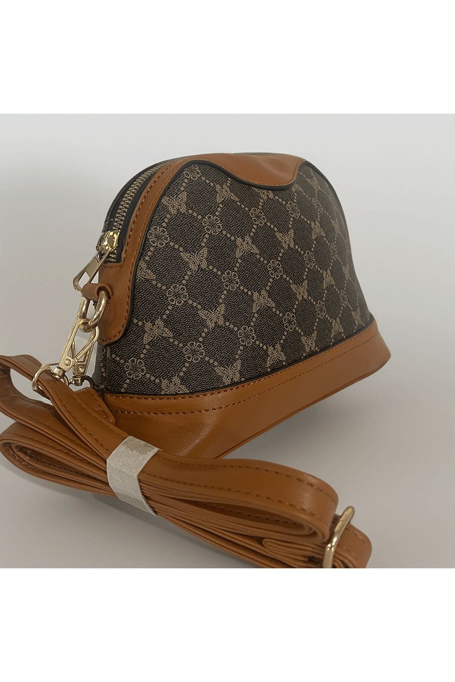 Brown patterned handbag - 1