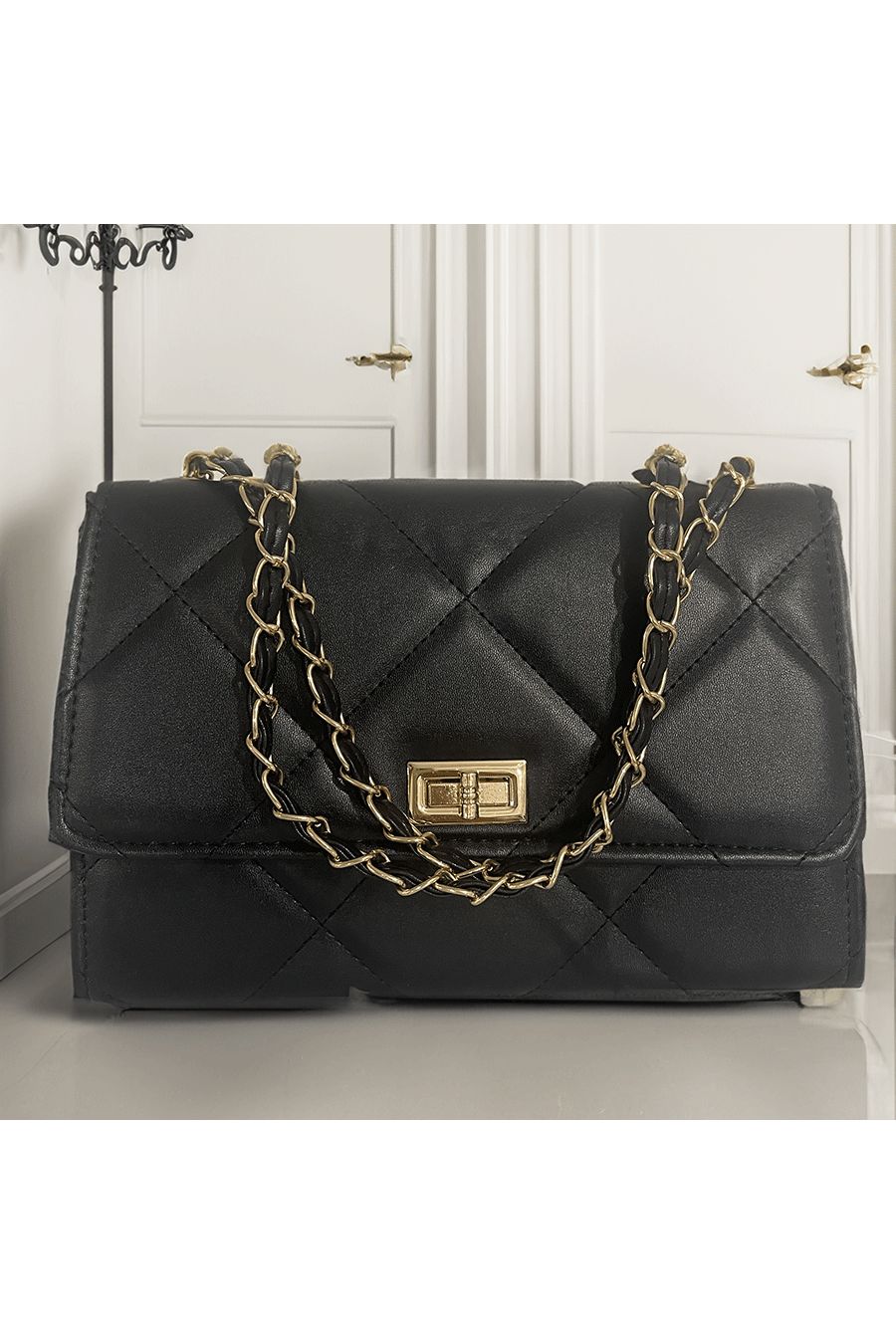 Black quilted handbag - 1