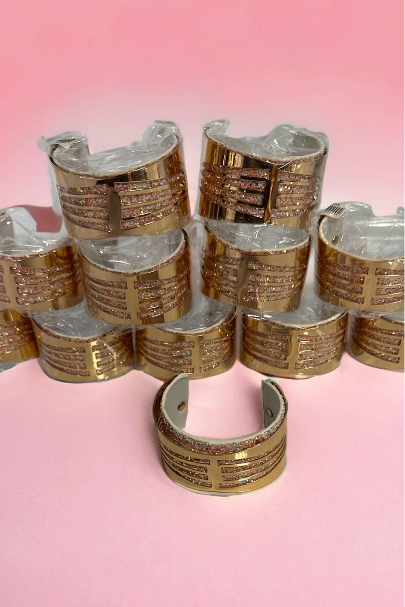 Set of 12 gold and white bracelets - 1