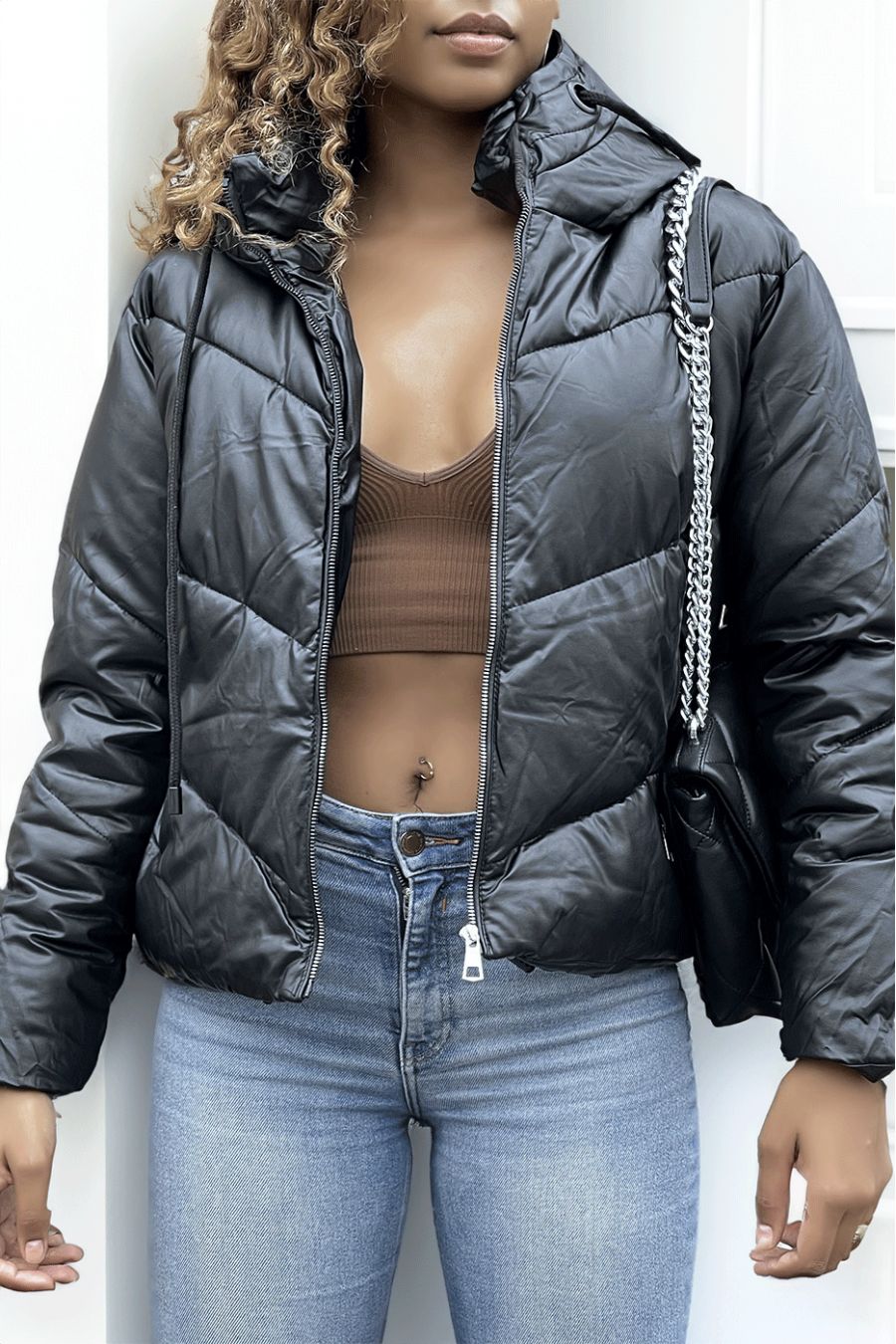 Black faux leather down jacket with black and silver zipper, hood and laces at the collar - 2