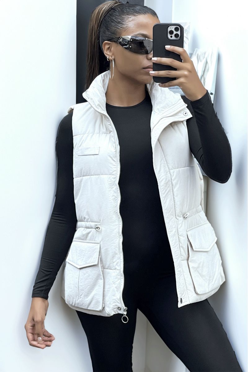 Beige sleeveless puffer jacket with high collar, pretty golden buttons and big sleeves - 2