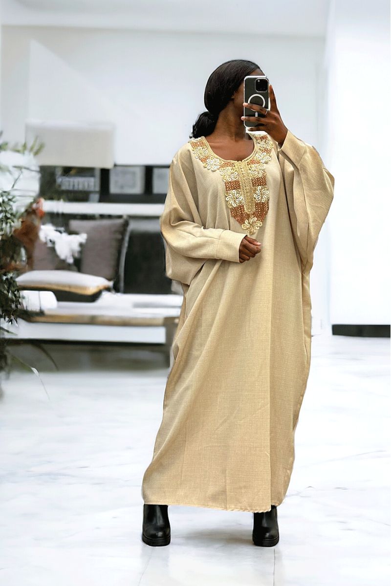 Beige abaya with a pretty loose cut and embroidery at the front - 1