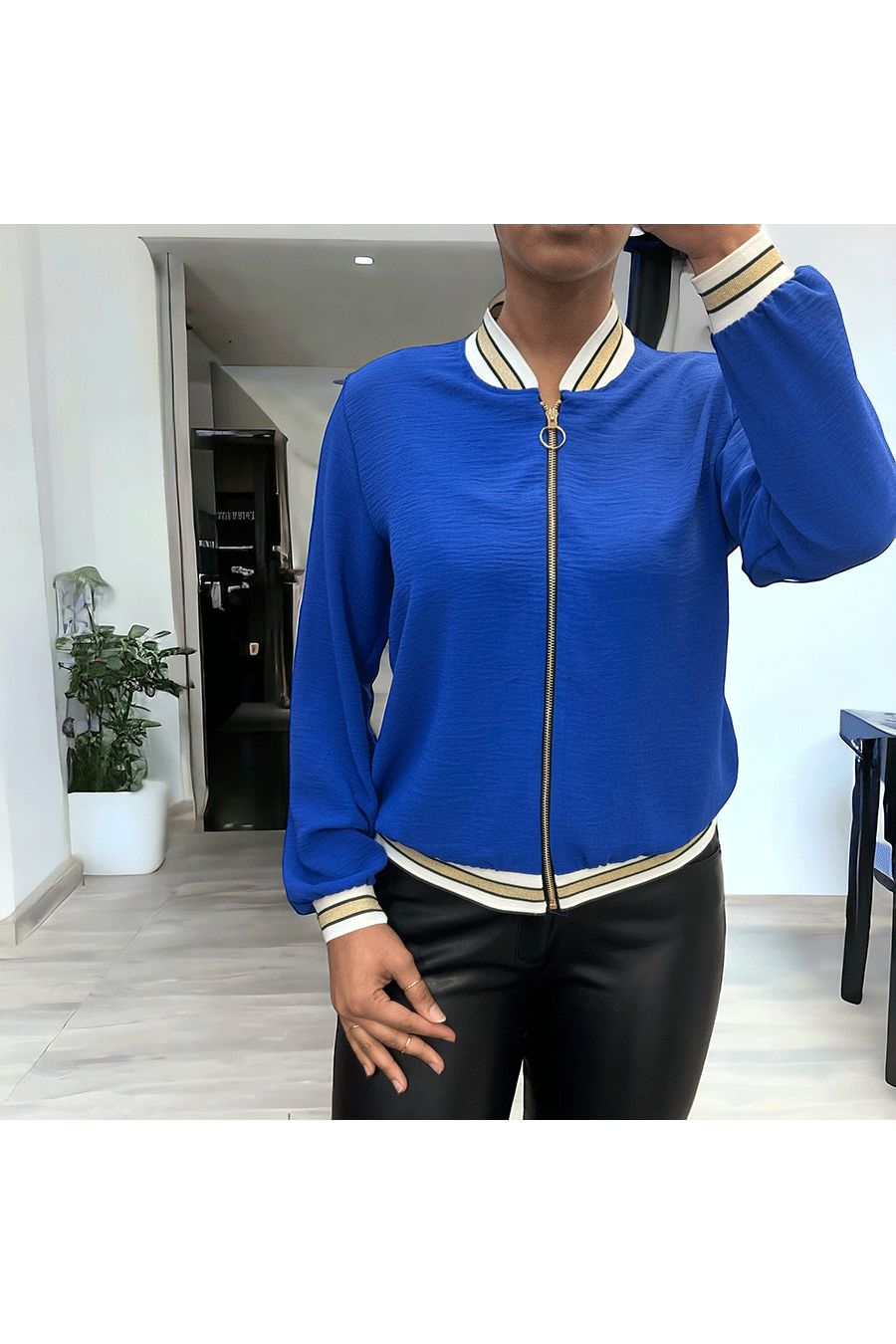 Light royal blue flowing jacket with zip and gold trim