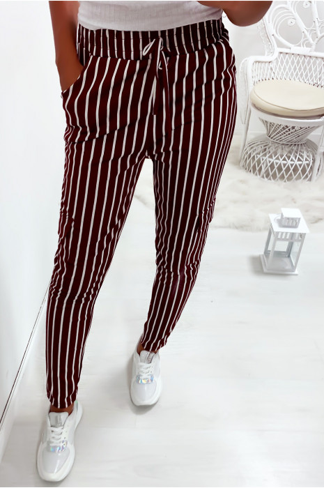 Pantalon jegging raye bordeaux et blanc avec poches sur les cotes