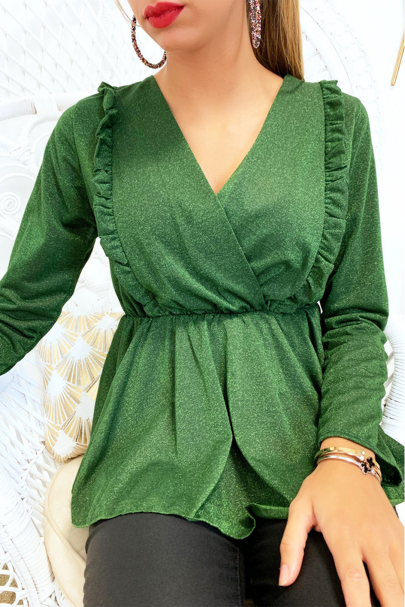 Jolie blouse verte croisé à l'avant avec froufrou dans une belle matière pailleté