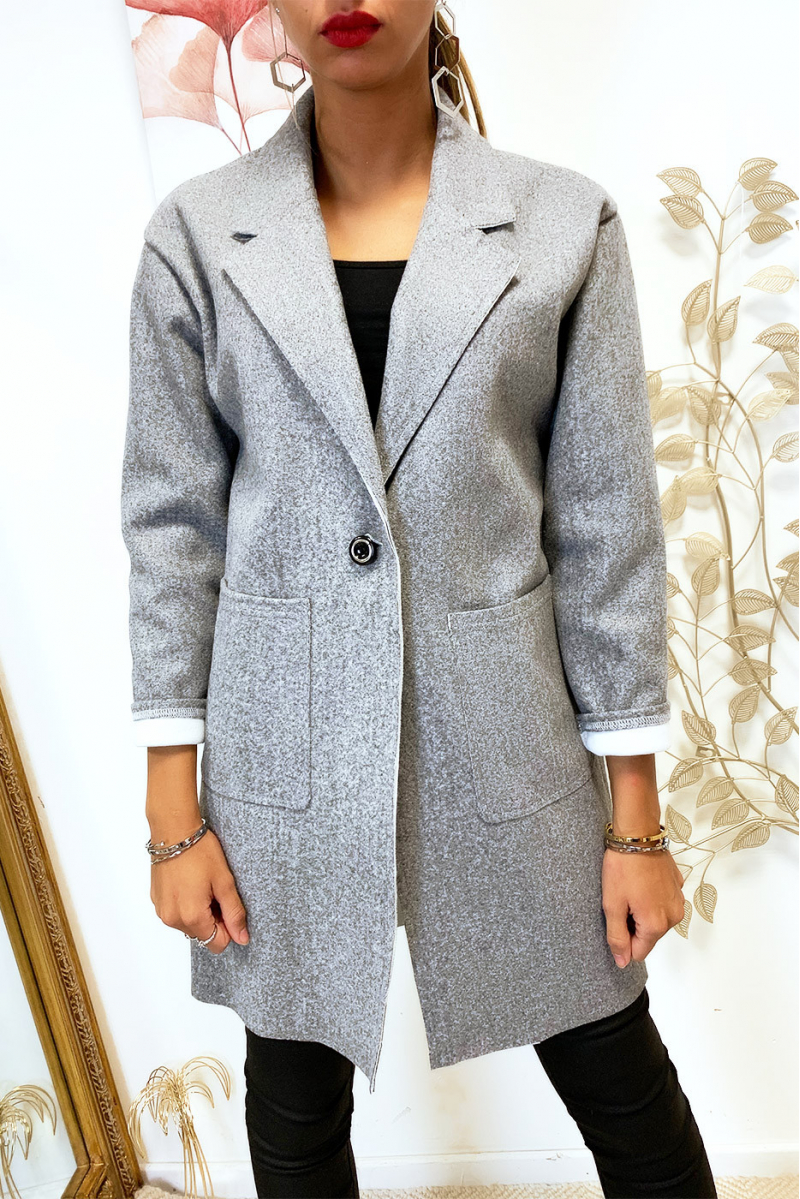 Joli veste masculine ample en gris avec bouton et poches