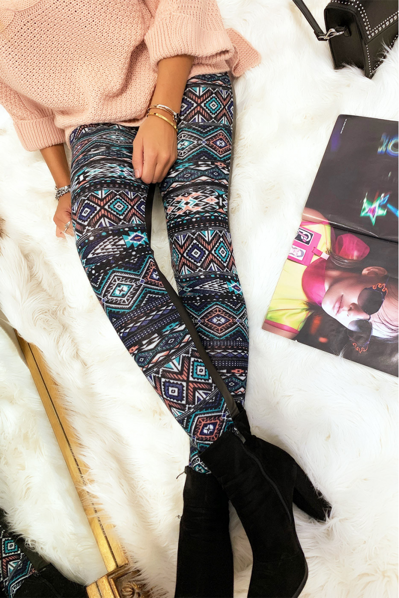 Colorful winter leggings in coral and black, fantasy patterns and sky behind. Fashion style. 148-2 - 5