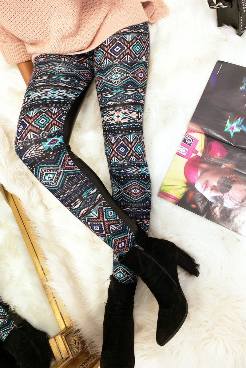 Colorful winter leggings in coral and black, fantasy patterns and sky behind. Fashion style. 148-2 - 6