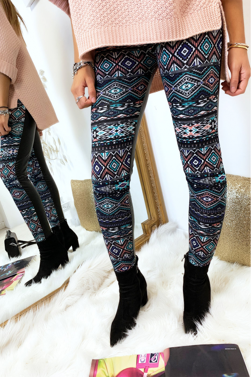 Colorful winter leggings in coral and black, fantasy patterns and sky behind. Fashion style. 148-2 - 7