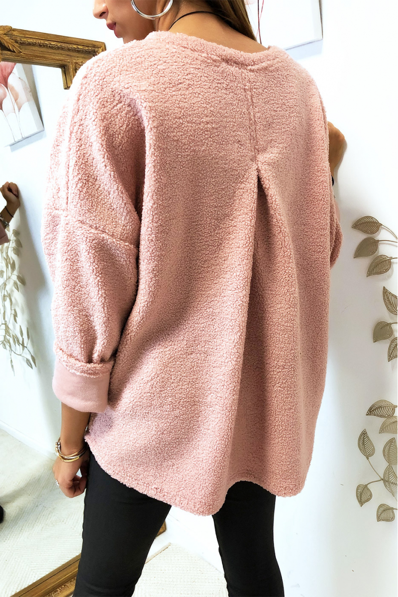 Mooie losse roze sweater van pluche materiaal met zakje en ketting