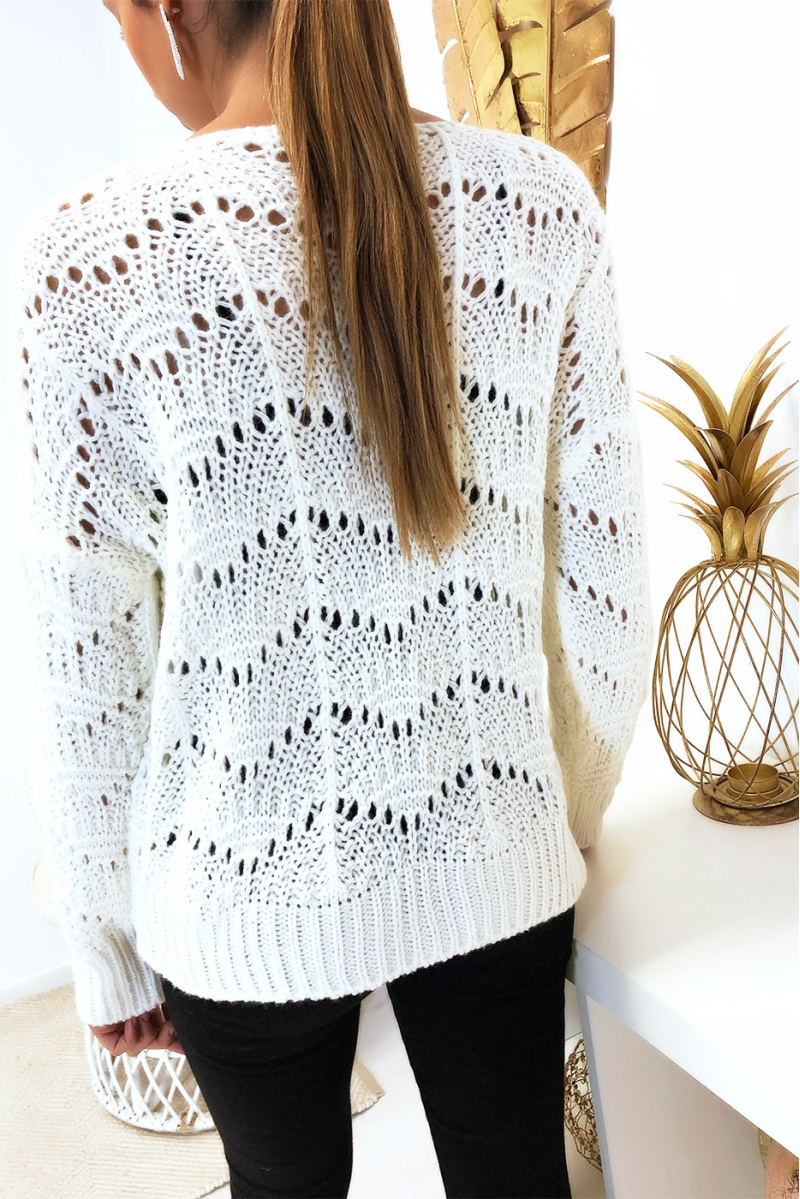 Witte sweater met mooi gevlochten patroon