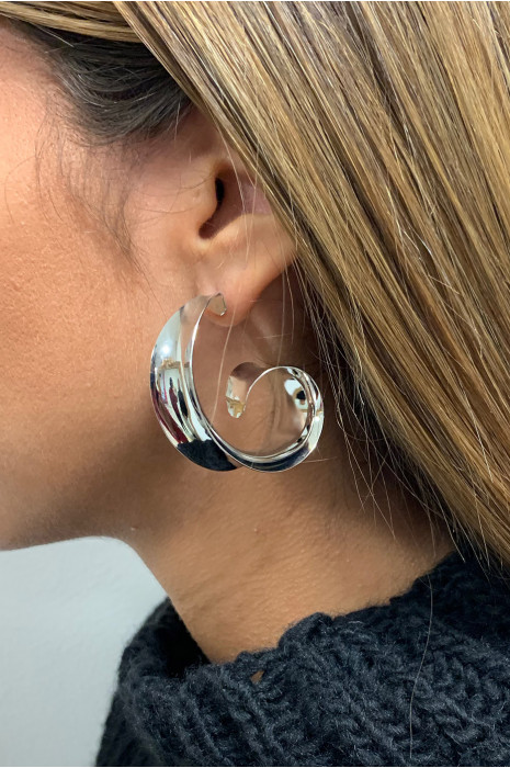 Boucle d'oreille argenté. - 1