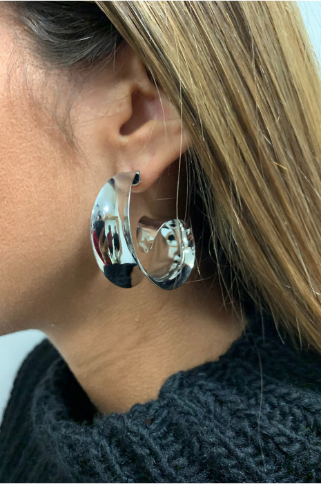 Boucle d'oreille argenté. - 2