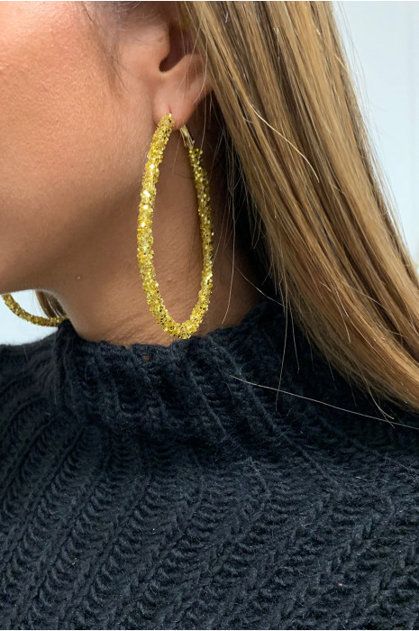 Boucle d'oreille doré. - 3