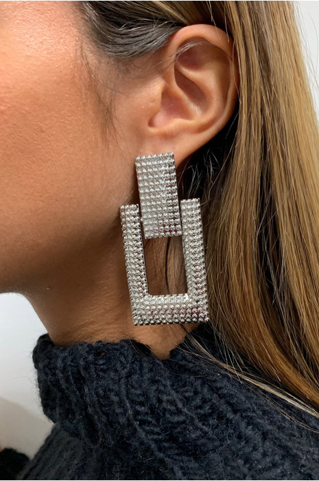 Boucle d'oreille argenté. - 2