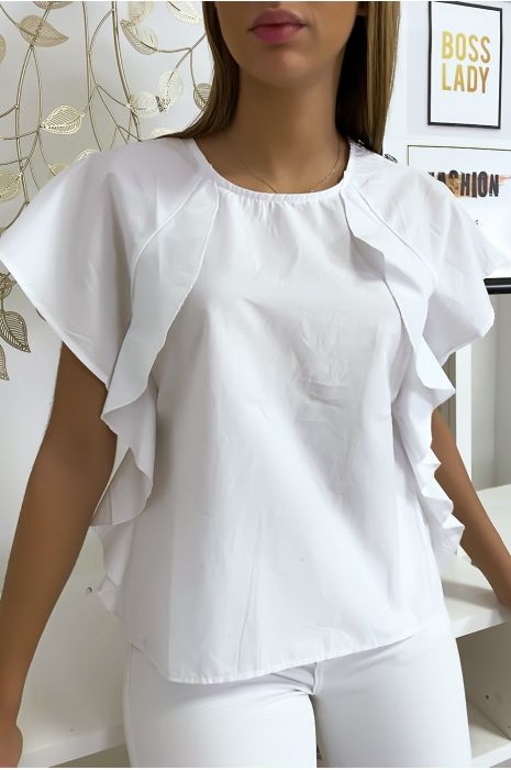 Blouse blanche à volant avec trois boutons à l'épaules