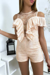 Pink lace playsuit with pretty pleated flounce