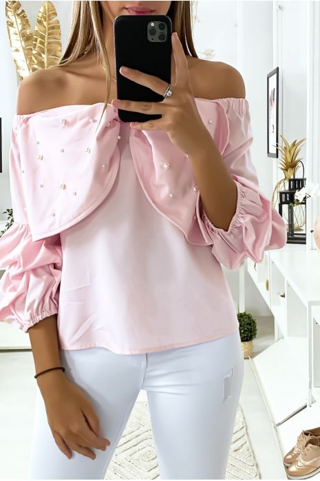 Blouse rose avec papillons ornée de strass à l'avant